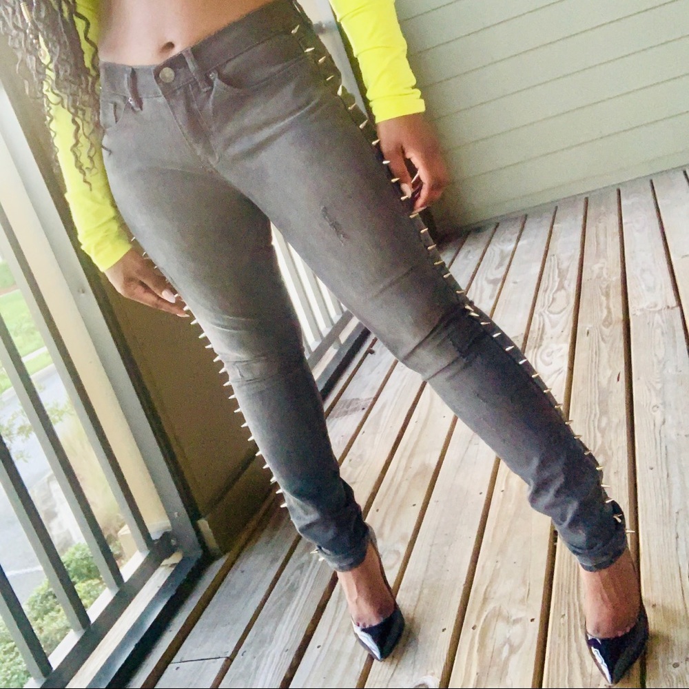 Dark grey distressed spiked skinny jeans